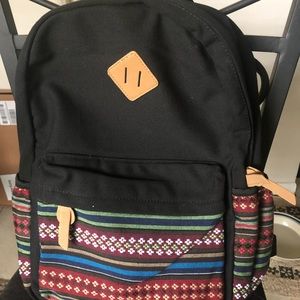 Backpack with multi colored retro-ish design